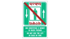 ZNAK - AC070 Nie korzystać z windy w razie pożaru / Do not use the lift in case of fire 10 x 15 cm FS - Folia samoprzylepna foto